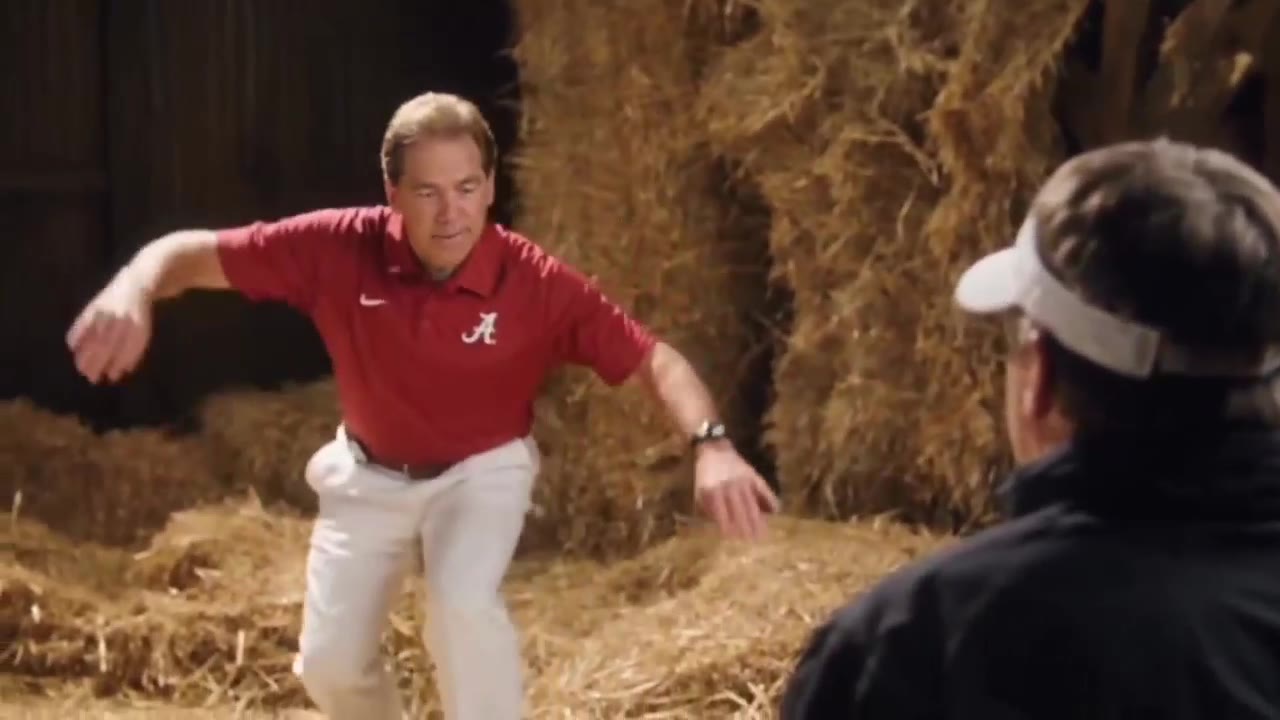 Rumpelstiltskin AI example: a man dances in a barn full of hay while another watches